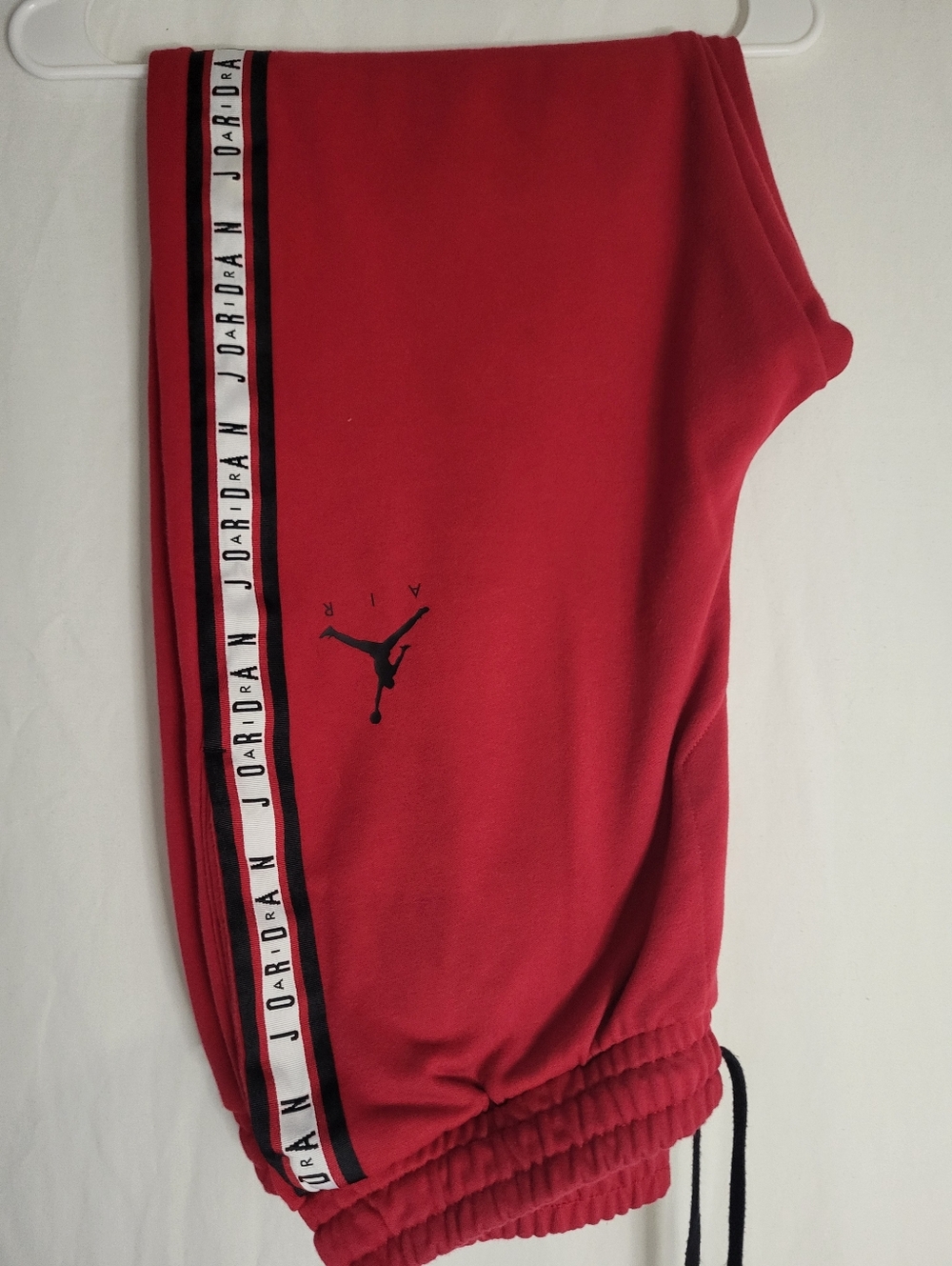 Jordan Red Athletic Pants with Black Jumpman Detail